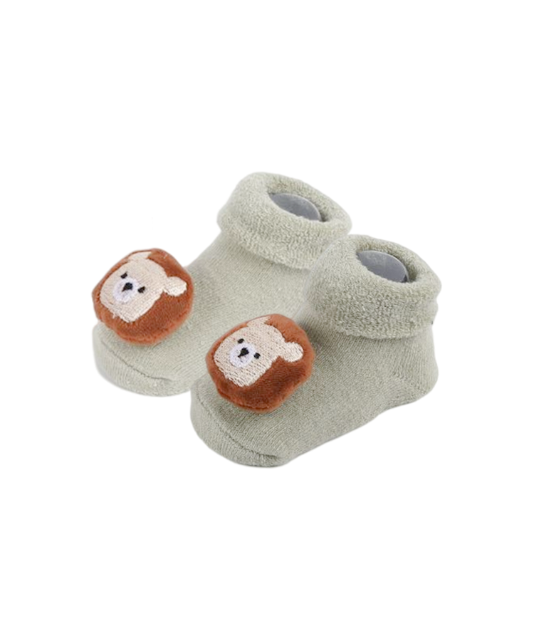 毛玉のついた綿製の新生児用モーグル靴下